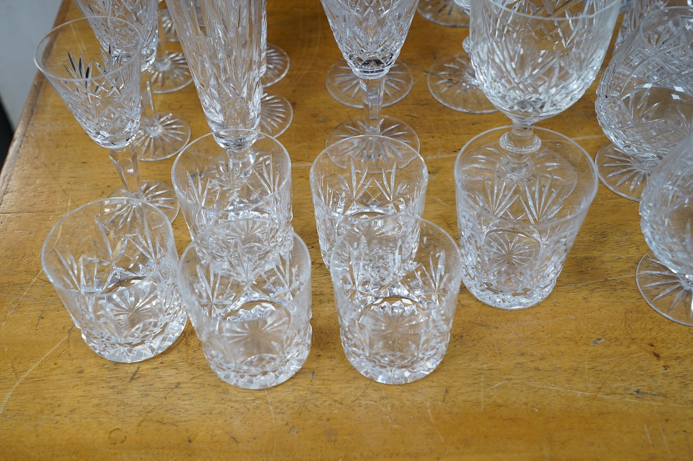 A collection of crystal glassware to include a set of ten tankards, wine glasses and tumblers, tallest 19cm. Condition - varies, mostly fair